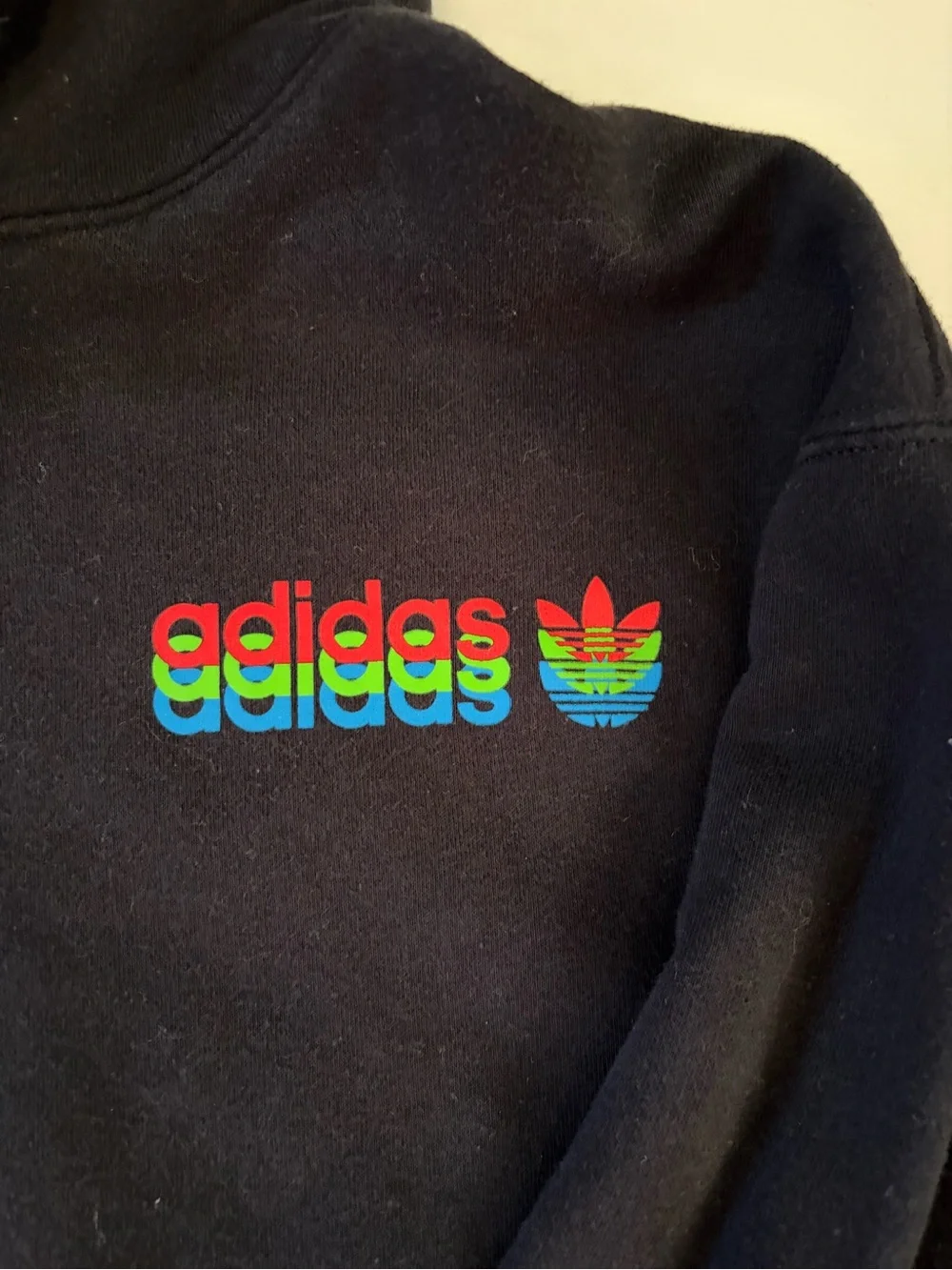 adidas Black Hoodie with Subtle Multicolor Logo